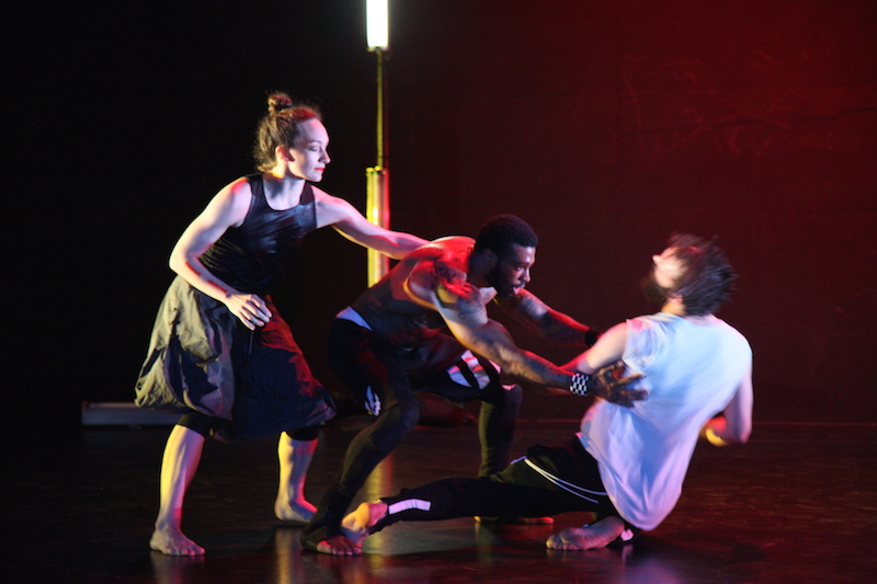 AJ Jonez and Oglivie support Bruder by ribs, narrowly catching him before he falls to the floor